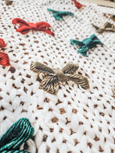 Holiday Bow Ruffled Sweater