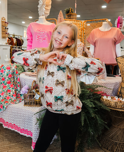 Holiday Bow Ruffled Sweater